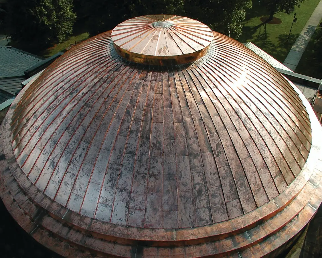 Craftsman Roofing crew installing a new roof in North Tonawanda